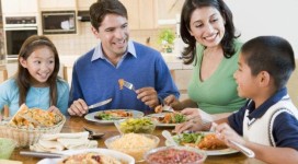 family-conversation-and-devotions-at-dinner-table